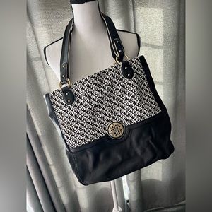 Kate Landry Tote Purse solid black with pattern fabric.